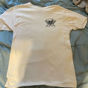 Cream graphic tee small skull and butterfly design